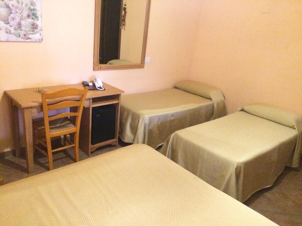 Albergo Arinde Rende Pokoj fotografie